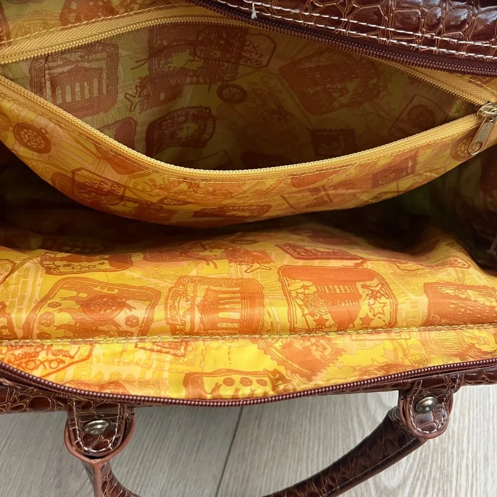 Samantha Brown NWOT blue and brown crocodile-embossed travel tote/weekender bag.